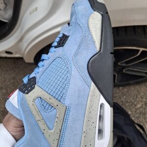 Jordan 4 Light Blue Suede Retro Sneaker with Speckled Accents